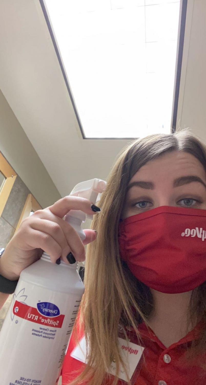 Sam Bosker, a Burke senior, has a variety of responsibilities, such as cleaning, at her job at HyVee.
