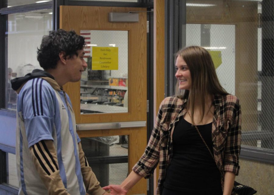 After reuniting, class of 2009 alumni and now couple, Erica Mruz and Carlos Ruano, share a quiet moment together to soak up the emotional day of seeing each other in person for the first time in 14 years. 