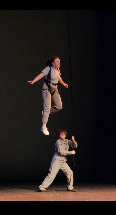 Fran Douglass, played by Stella Clark-Kaczmarek gets hoisted in the air by Scubby, played by Michale White. This was first time a student has been hoisted in a production.