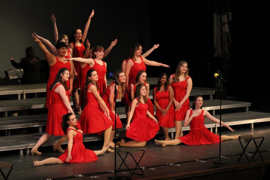 Duchesse Academy “Sacre choir” finish their performance with a pose.