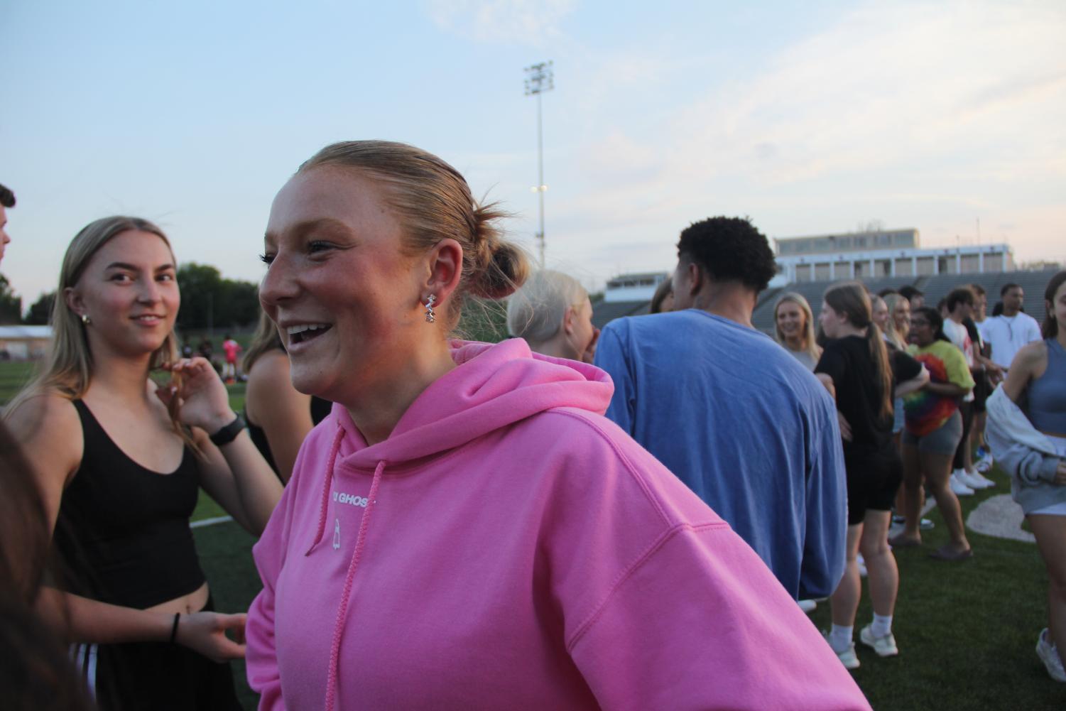Seniors Avery Christensen and Hudson Miller wait for their name to be picked by the captains for the kickball teams. Captain Brady Sullivan picked both Miller and Christensen.