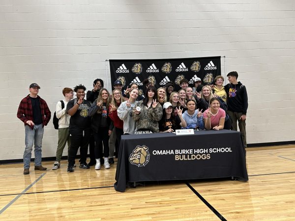 Sophia Scott signs with Tennessee at Burke high school. 