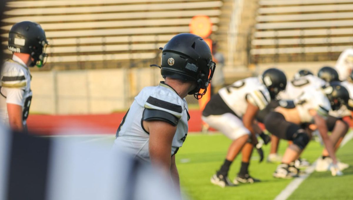 Brayden Gammel (Junior) Lines up at the 30 Yard line for the first Game of the season, In Burke High's New stadium.