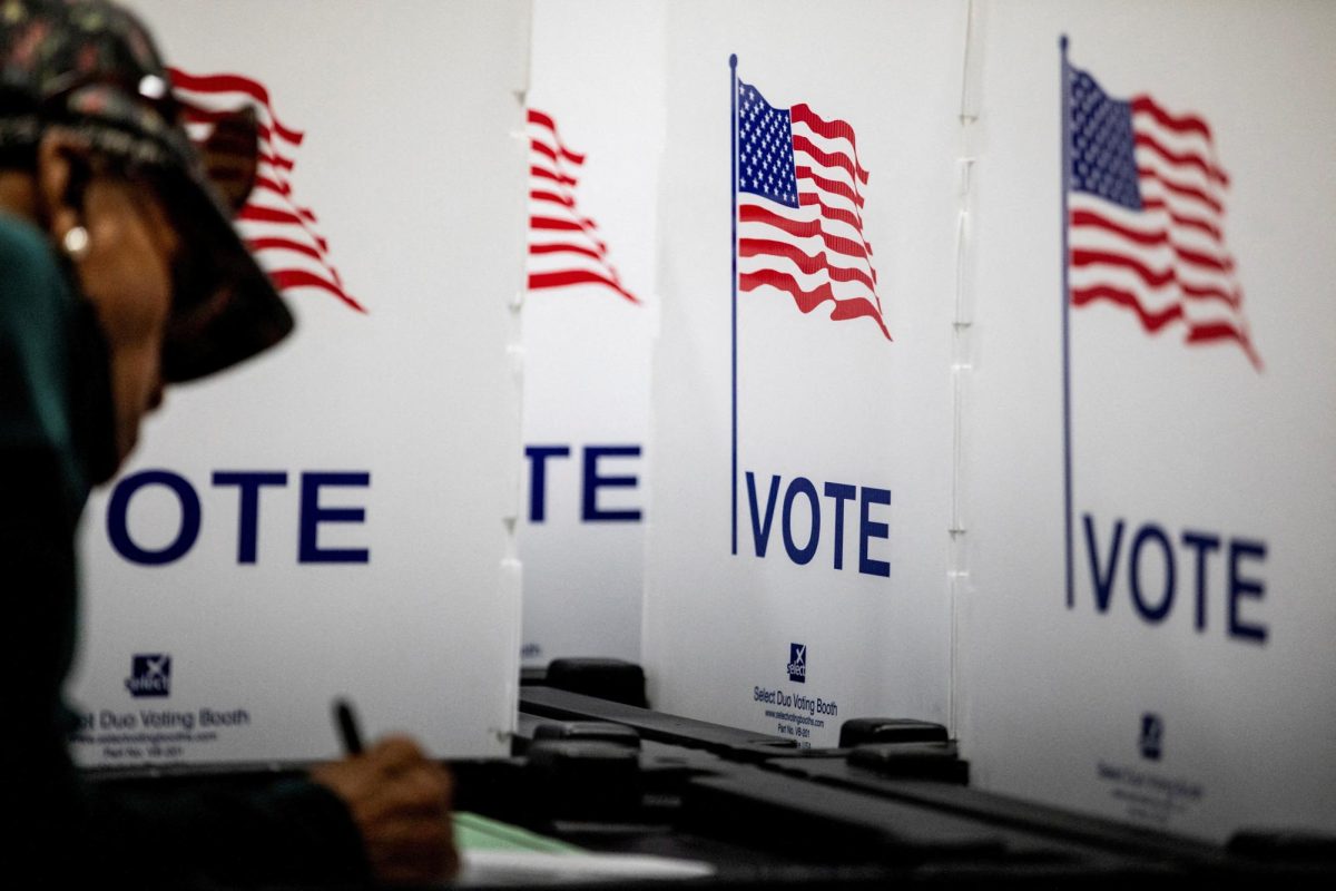 A person votes in the 2024 U.S. presidential election on Election Day at Pasteur Elementary School in Detroit, Michigan, U.S., November 5, 2024. REUTERS/Emily Elconin