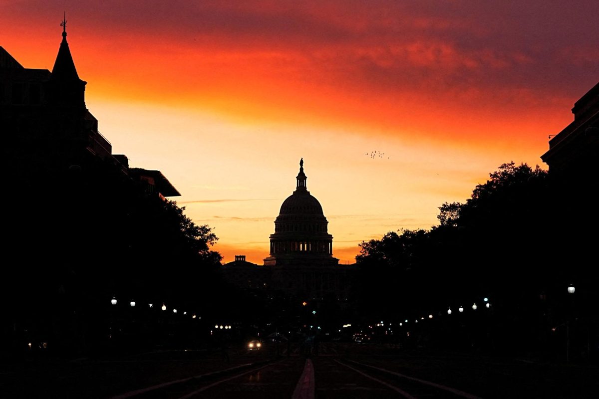 The sun rises behind the Capitol Building, weeks into the continuing U.S. government shutdown on Capitol Hill in Washington, D.C., U.S., October 18, 2025. REUTERS/Aaron Schwartz