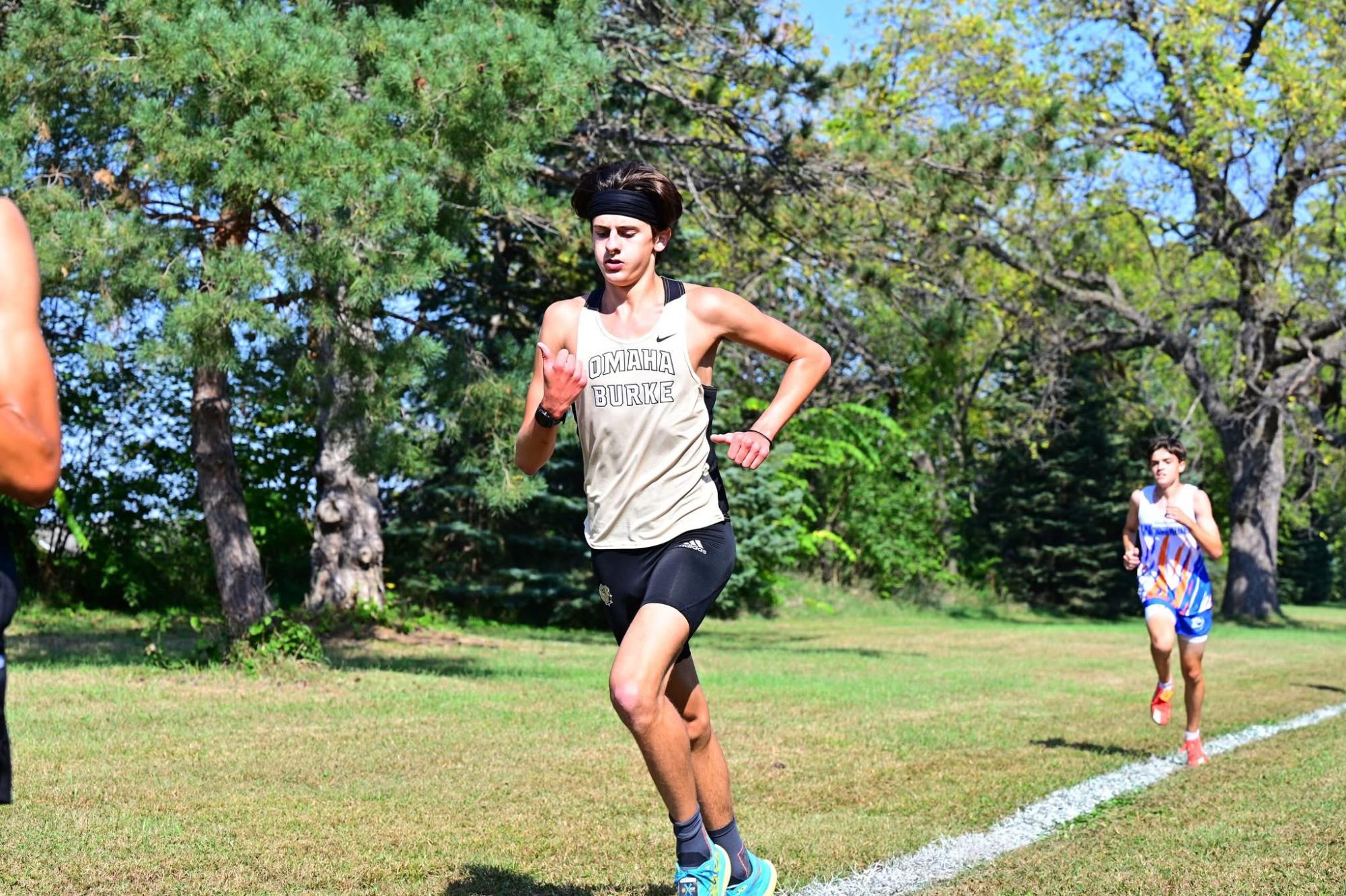 Running during the Burke Invitations in late September, Burke senior Dillon Birge completes the final leg of the race.