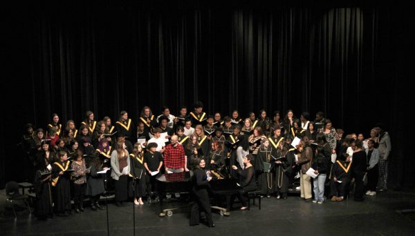 The Friend Choir takes the stage to finish the concert.