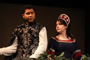 Zayne Prusia acting as "The King of France" and Mae Gleason acting as "Cordelia" 