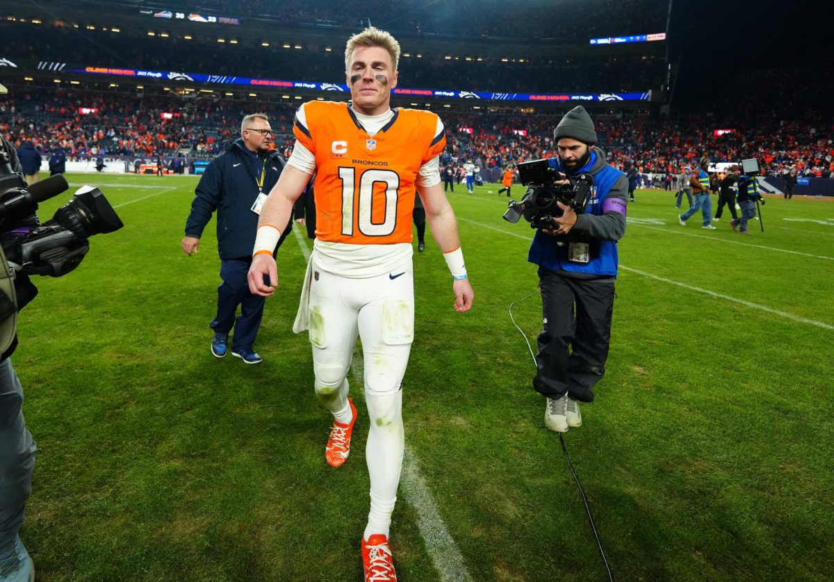 Jan 17, 2026; Denver, CO, USA; Denver Broncos quarterback Bo Nix (10) reacts after winning an AFC Divisional Round playoff game against the Buffalo Bills at Empower Field at Mile High. Mandatory Credit: Ron Chenoy-Imagn Images