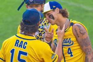 RobertAnthony Cruz (left) and KJ Jackson share a moment before the Savannah Bananas game against The Fire Fighters on Saturday, June 13 at Memorial Stadium in Lincoln.